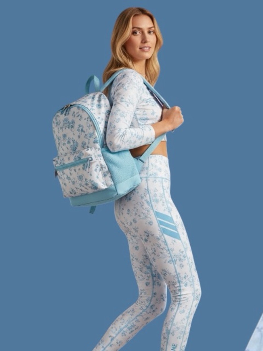 Source Unknown Light Blue and White Floral Bow Print Backpack